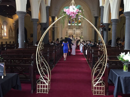 Gold Cinderella Arch With Flowers