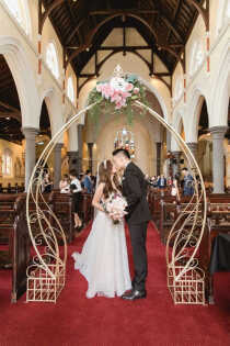 Gold Cinderella Arch With Flowers