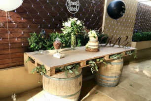 Rustic dessert table at a home engagement party