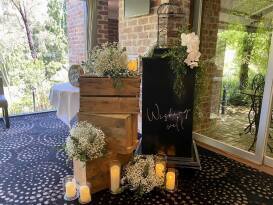 A rustic wishing well display at Potters Receptions, Warrandyte 
