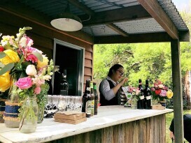 Rustic Bar setup at a backyard wedding