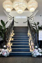 Our LED candle & vase package lining the stairs at James Said