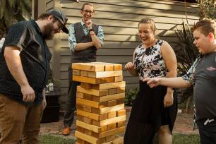 Wedding guests playing Giant Jenga 