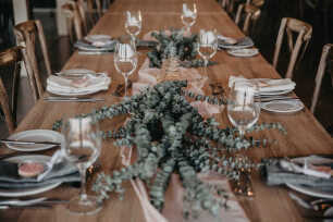 Rustic dining tables for a wedding reception