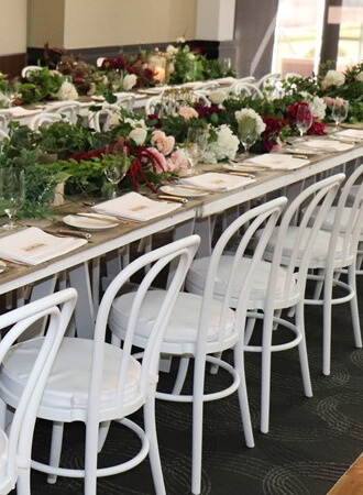 Tables and chairs setup for a wedding a Mulgrave Country Club
