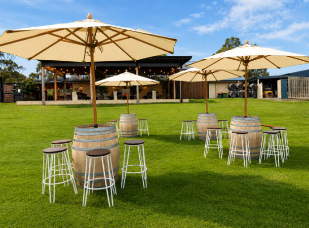 Wine barrels and stools setup for a wedding at Blueberry Winery Yarra Valley