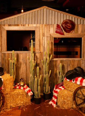 Cactus and other western props setup for a corporate Christmas Party