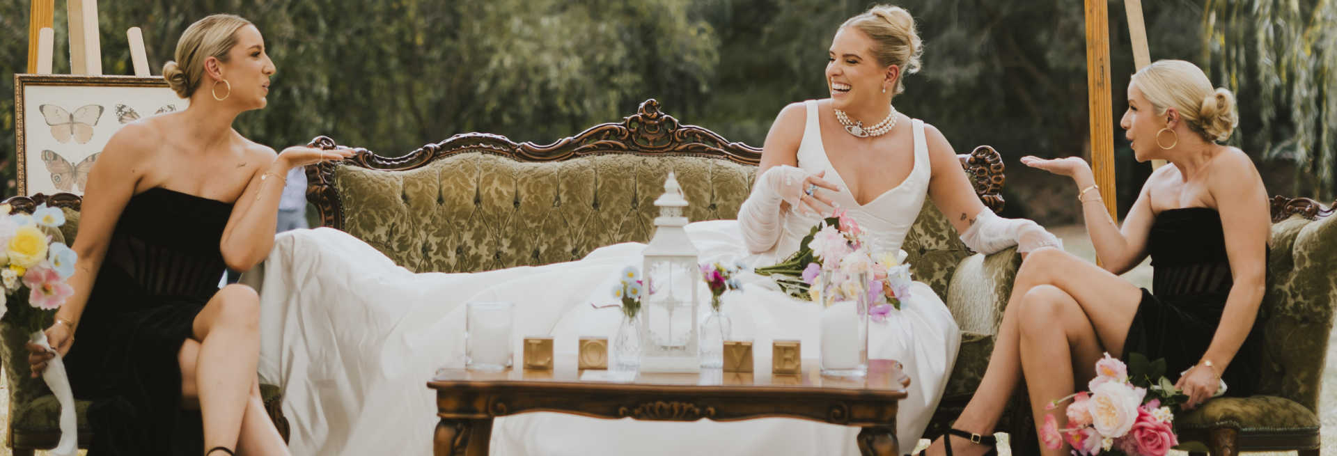 laughing bride on vintage couch