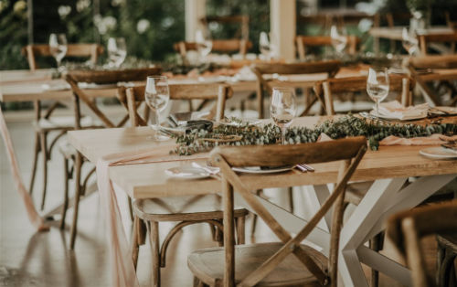 Photo shows a rustic table setup at Elmswood Estate