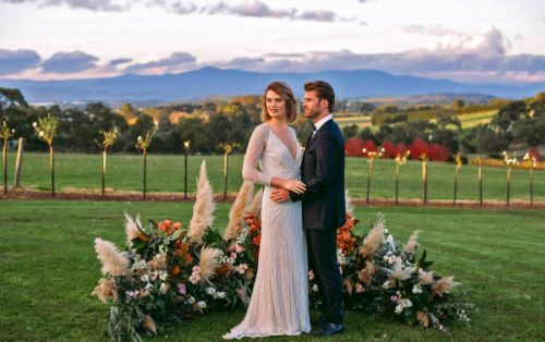 Photo shows a wedding ceremony at Vines of the Yarra Valley